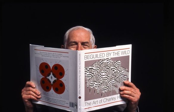 Charley Harper with his book, Beguiled by the Wild